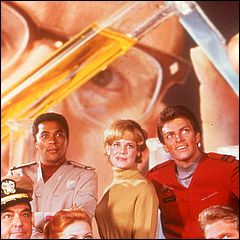 Land of the Giants cast with Irwin Allen in background