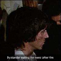 Bystander waiting for news after fire