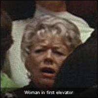 Woman in first elevator