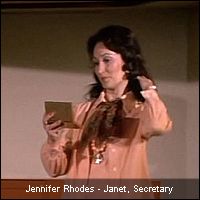 Jennifer Rhodes - Janet, Secretary